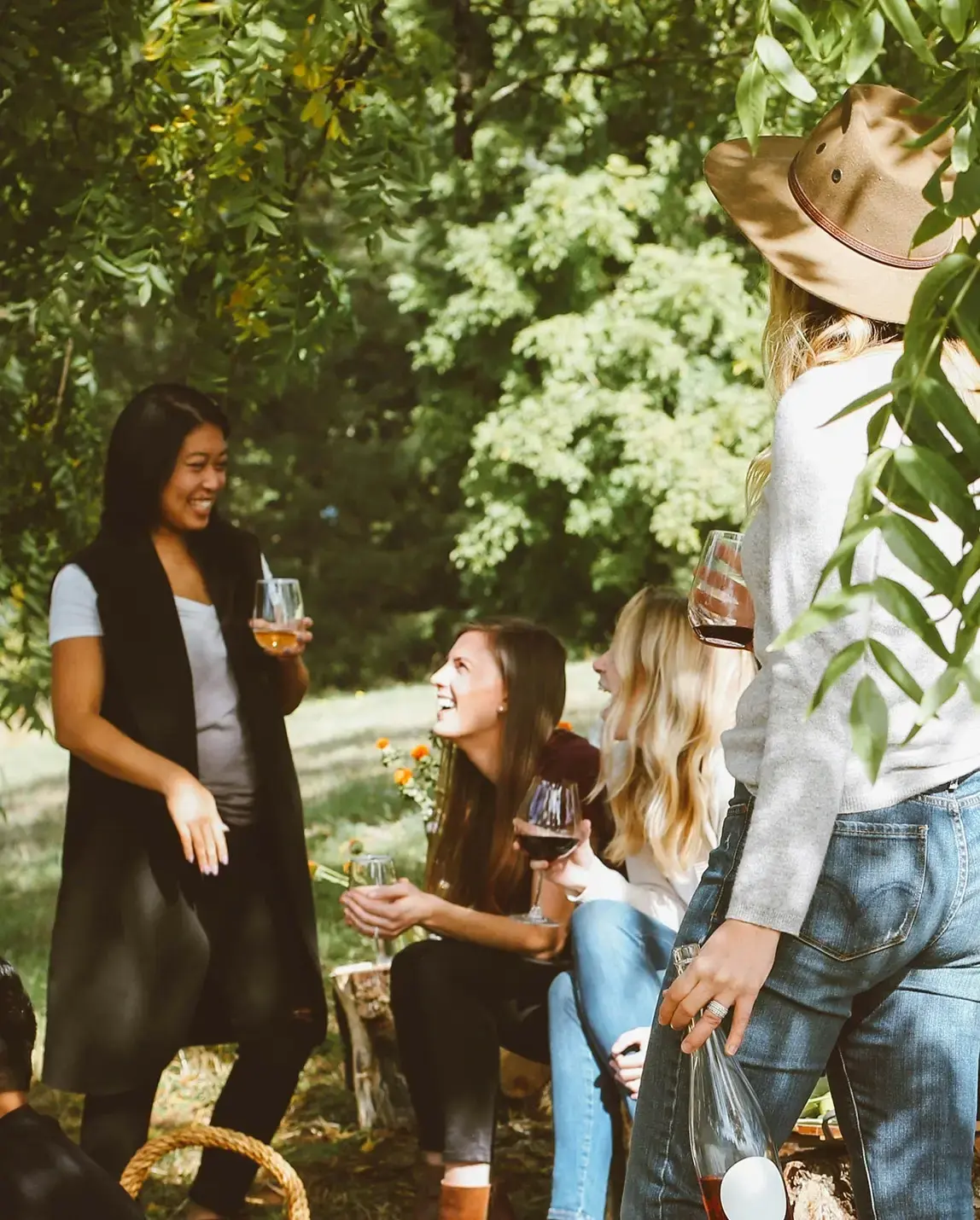 women-drinking-wine-in-garden
