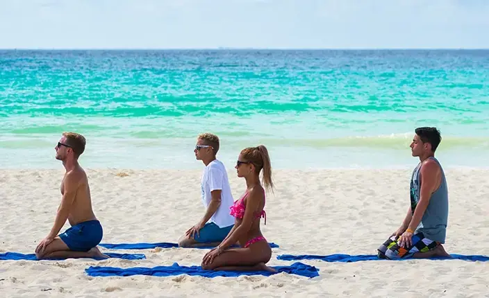 yoga on tropical beach